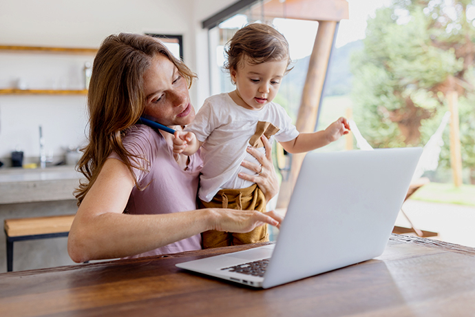 decorative image, women on the phone while holding baby