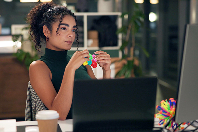 decorative image, women in a work setting thinking