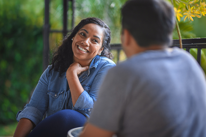 decorative image, two people talking