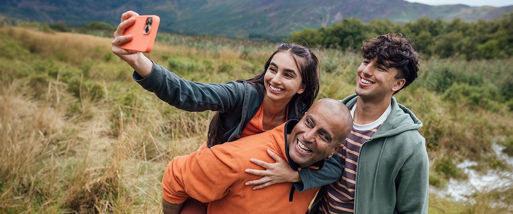 Dad and kids outside hiking